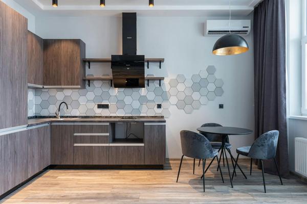 A sleek, modern kitchen with updated appliances.